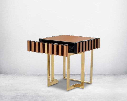 End table in gold mirror with gold plated stainless steel base The table has open one drawer.