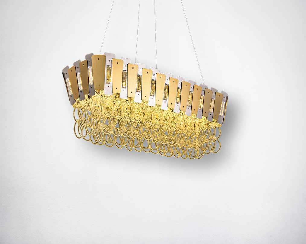 Ceiling pendant light in stainless steel & gold plated stainless steel with crystal rings in modern classic design.