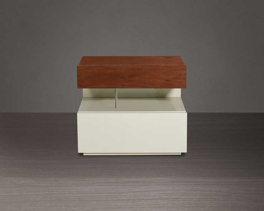 The gorgeous bedside table closed drawer comes in beige glossy finish & light walnut top with one drawer.