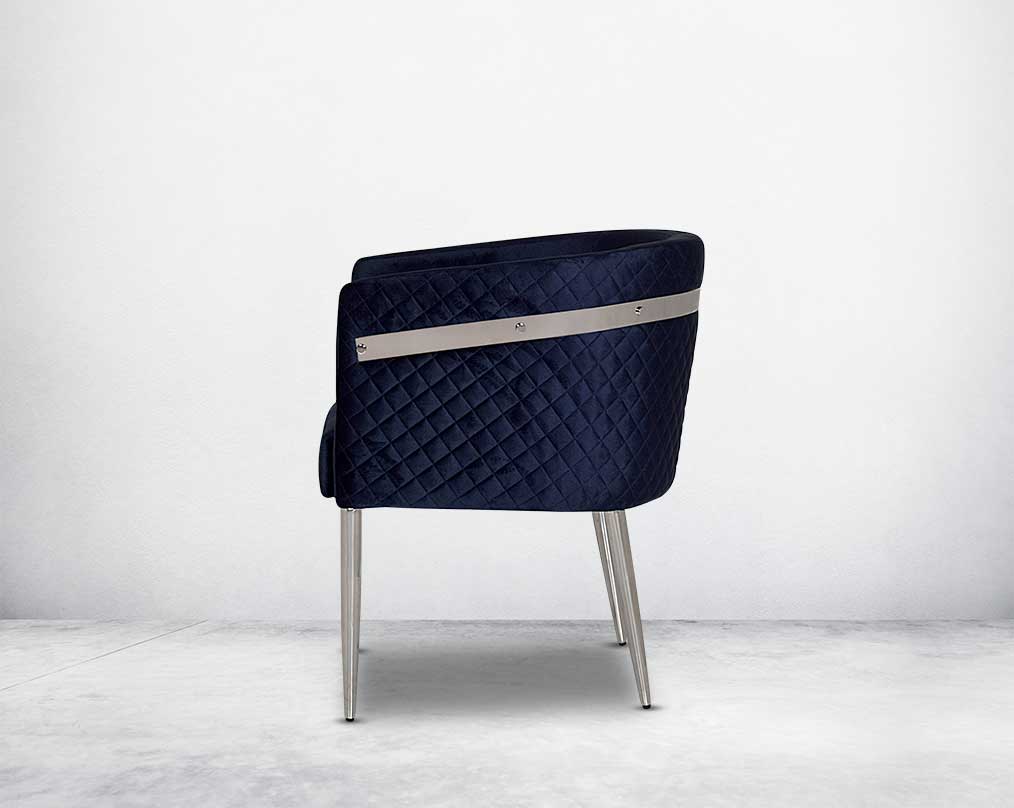 Accent leisure back armchair upholstered & quilted in luxurious velvet fabric with high polished stainless steel frame and legs.