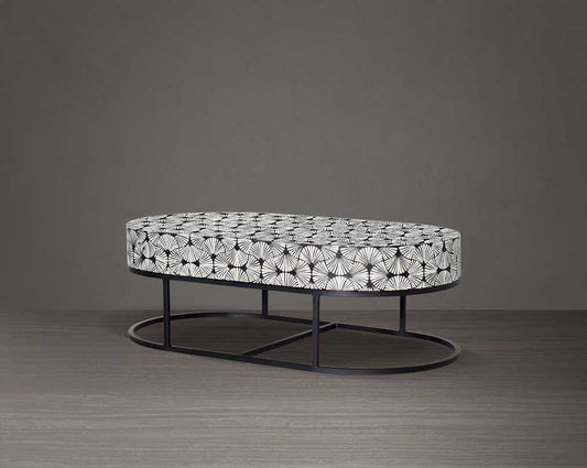 This gorgeous black and white inlay coffee and in floral pattern with a black metal base is a perfect statement piece in your living room.