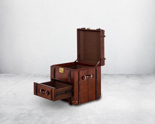 End table in distressed cognac leather in a vintage look with storage and open 1 drawer in trunk design.