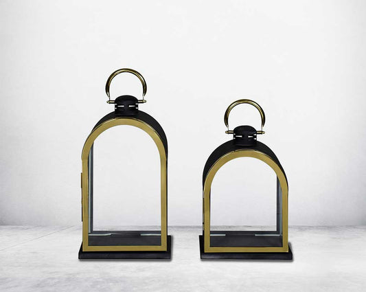 Lantern in clear glass and metal with gold plated stainless steel frame. 1 large 2 small