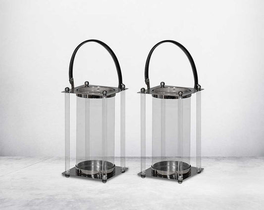 This lantern is crafted from leather, glass, and stainless steel and is perfect for adding aesthetic warmth and conviviality in any nighttime outdoor space. 1 large 2 small