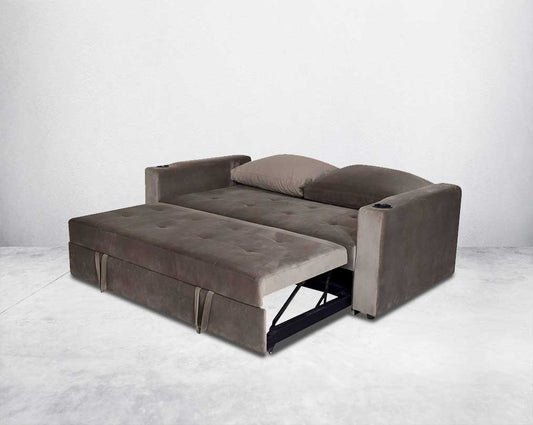 Our stylish sofa cum bed that enhances the aesthetic appeal of your living space. Featuring wide arm rests with two glass holders and deep cushioned seat that offers maximum utility space. It comes upholstered in fabric with wooden legs