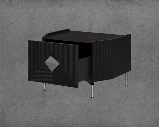 The gorgeous bedside table is in a black glossy finish with a spacious open drawer with stainless steel handle & base.