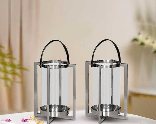 this lantern A master of reimagining classic forms, solid sheet metal frames feature broad panels of clear glass in a circular design with table