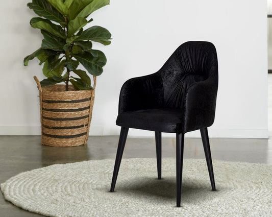 Dining chair upholstered in fabric with legs in wood with plant