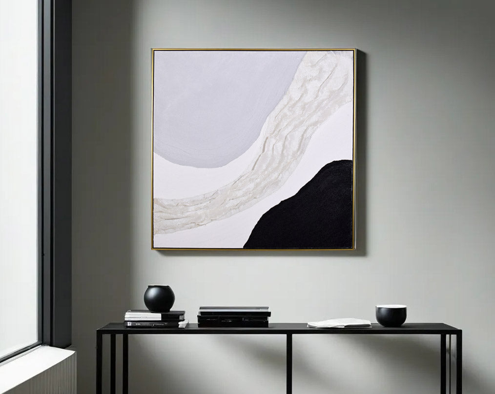 Abstract acrylic painting on canvas with gold frame perfect to enhance any modern and contemporary space with table and book