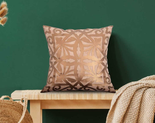 Beige and antique gold cut out leather cushion with table