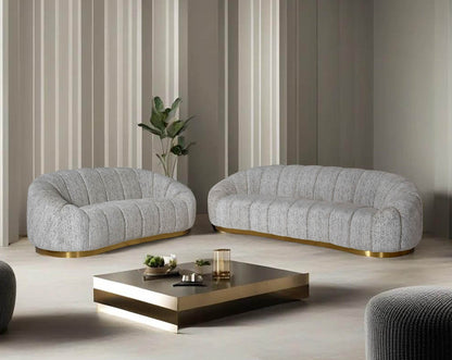 This 3+2 beautiful fabric sofa features vertical channel quilting with an outstanding design.