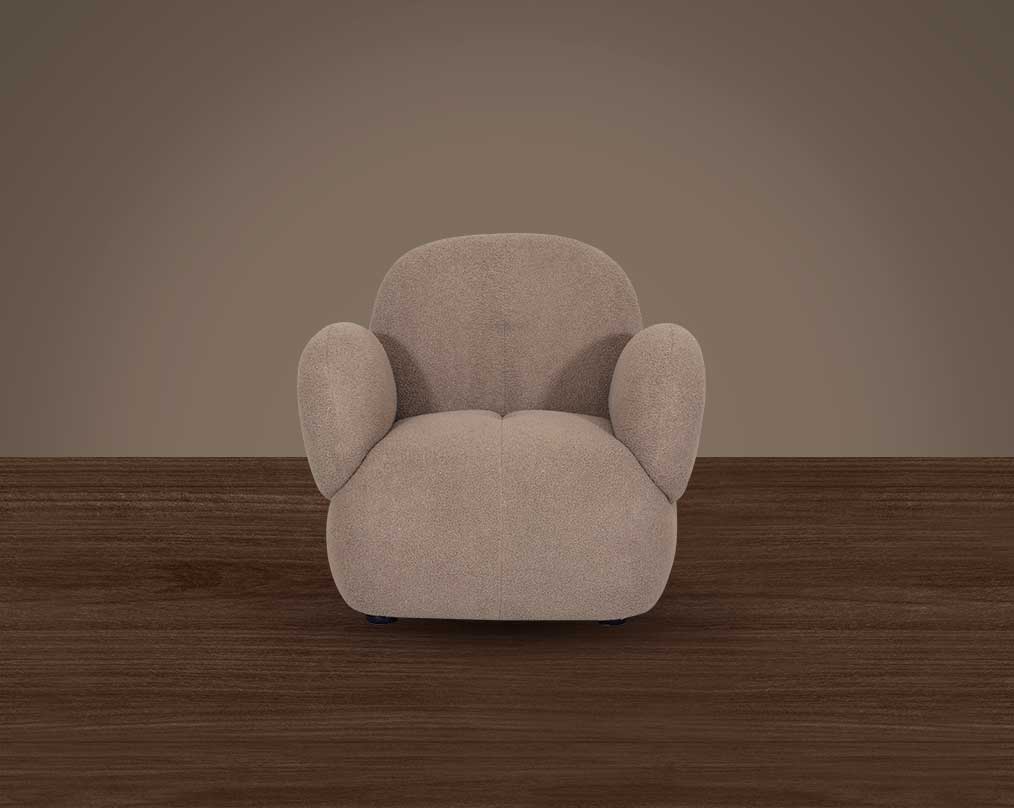 This sinuous & soft 1 seater sofa exudes a sense of calm & ease, upholstered in high-quality boucle fabric with wooden legs front view