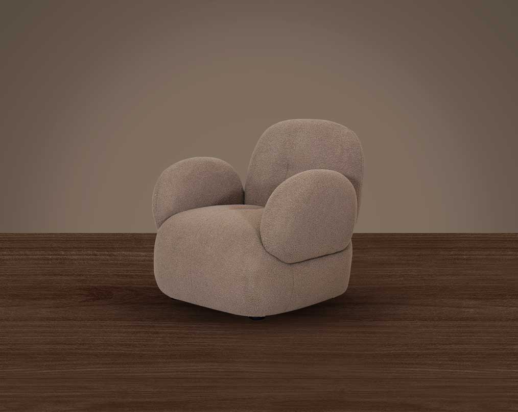 This sinuous & soft 1 seater sofa exudes a sense of calm & ease, upholstered in high-quality boucle fabric with wooden legs side view