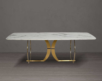 This beautiful & delicate 8-seater marble dining table is crafted to perfection. It is cast with a natural white a cursive artful base in matt gold plated stainless steel.