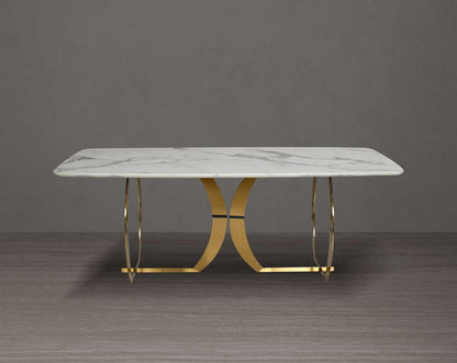 This beautiful & delicate 6 & 8 seater marble dining table is crafted to perfection. It is cast with a natural white a cursive artful base in matt gold plated stainless steel