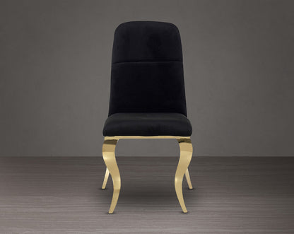 Dining chair upholstered in fabric front view with gold plated stainless steel legs.