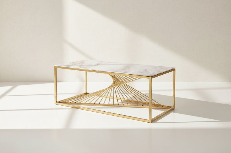 Coffee table with marble finish glass top and gold plated stainless steel base in a geometric pattern.