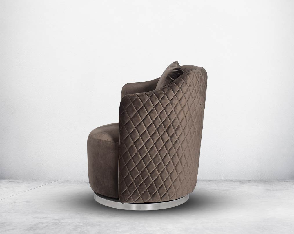 Quilted fabric leisure chair with stainless steel base with swivel, it comes with a cushion to compliment.