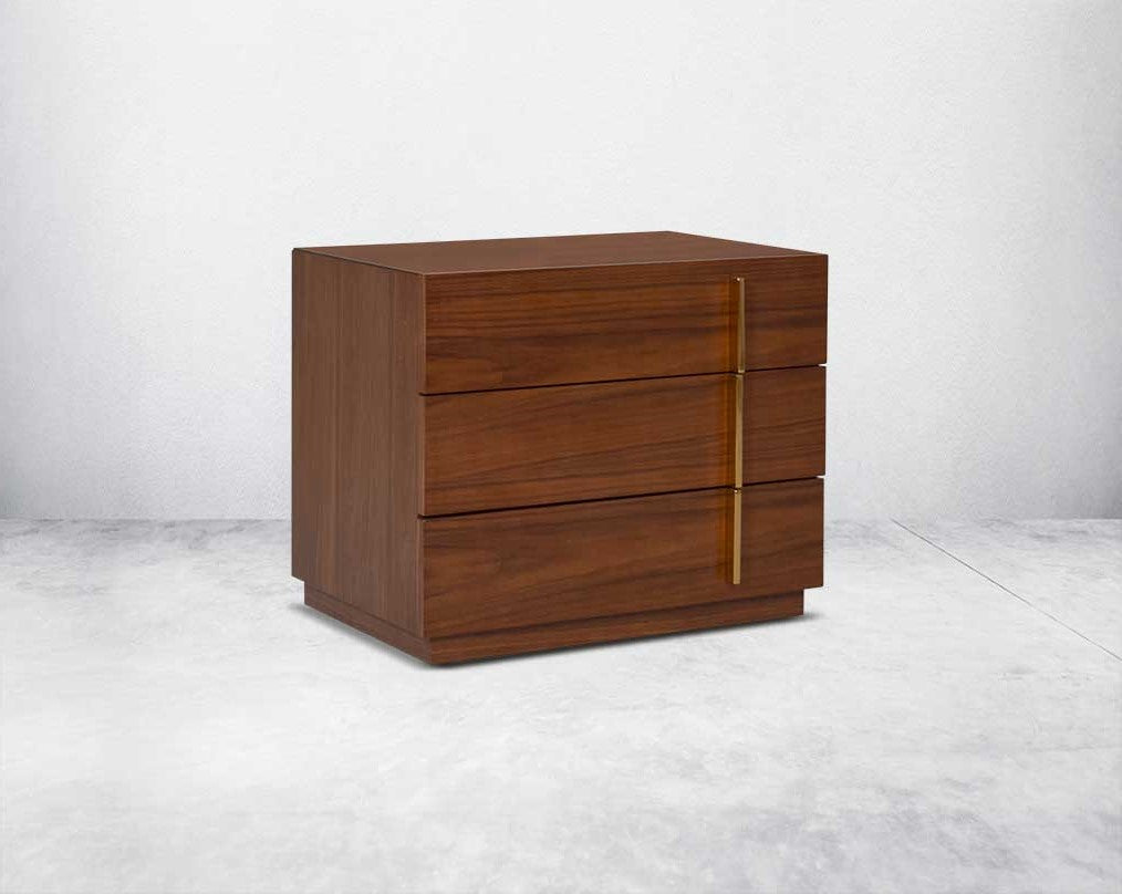 Symmetry and style define this eye-catching bedside table closed drawer , constructed from light walnut veneer with three drawers & gold-finished stainless steel handles.
