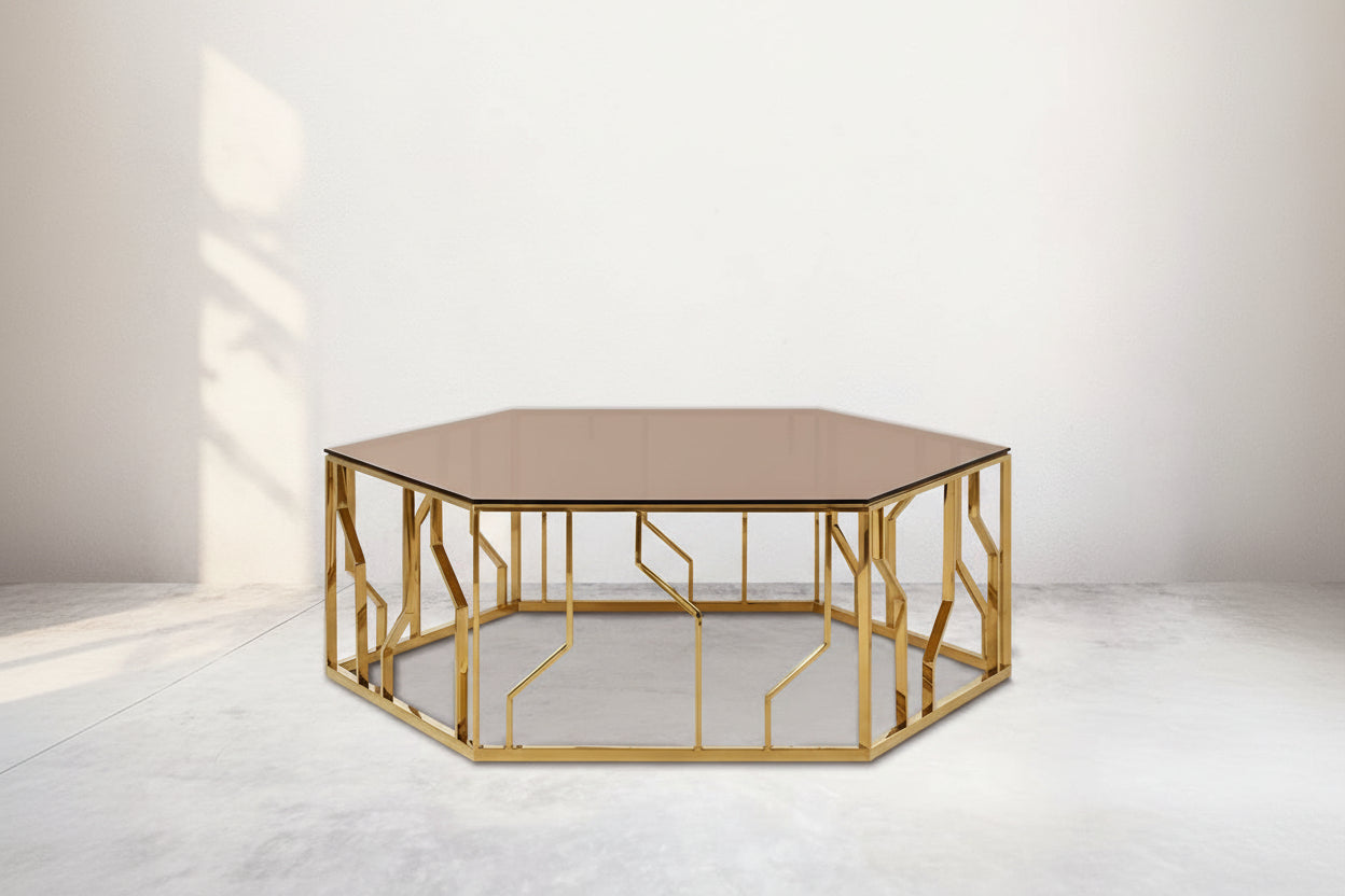 This elegant coffee table brings the metallic trend into the forefront with the gold finish on the stainless steel ornamented geometric base.