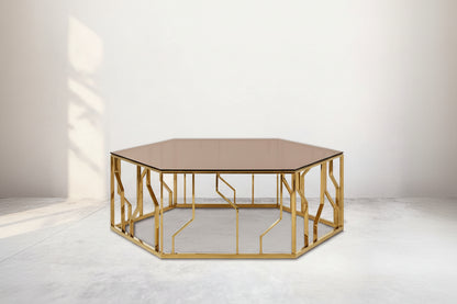 This elegant coffee table brings the metallic trend into the forefront with the gold finish on the stainless steel ornamented geometric base.
