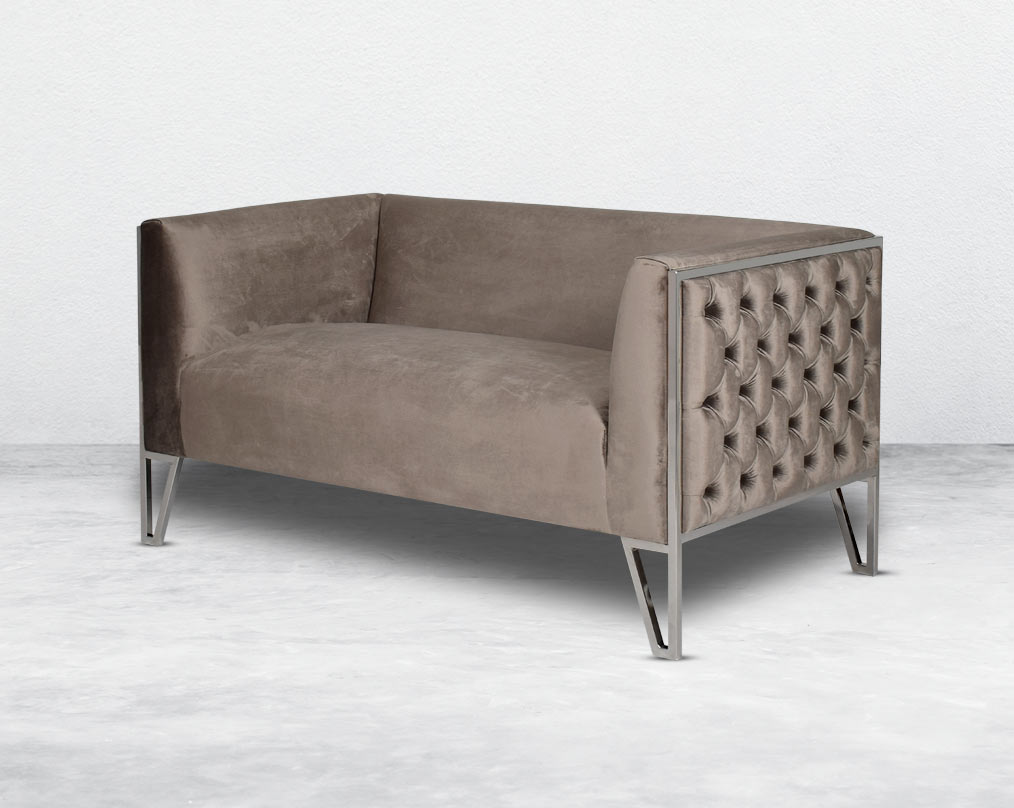 This 2  seater sofa set is the perfect addition to any living space looking to add a modern classic feel. Crafted beautifully with high polished stainless steel geometric legs and upholstered in luxurious velvet