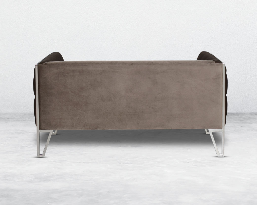 This 2  seater sofa set is the perfect addition to any living space looking to add a modern classic feel. Crafted beautifully with high polished stainless steel geometric legs and upholstered in luxurious velvet