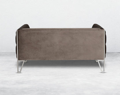 This 2  seater sofa set is the perfect addition to any living space looking to add a modern classic feel. Crafted beautifully with high polished stainless steel geometric legs and upholstered in luxurious velvet