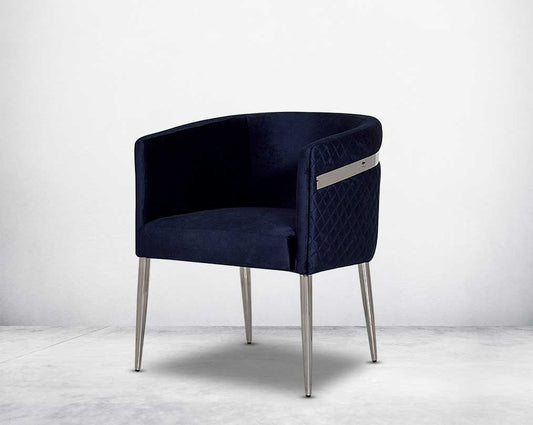Accent leisure armchair upholstered & quilted in luxurious velvet fabric with high polished stainless steel frame and legs.