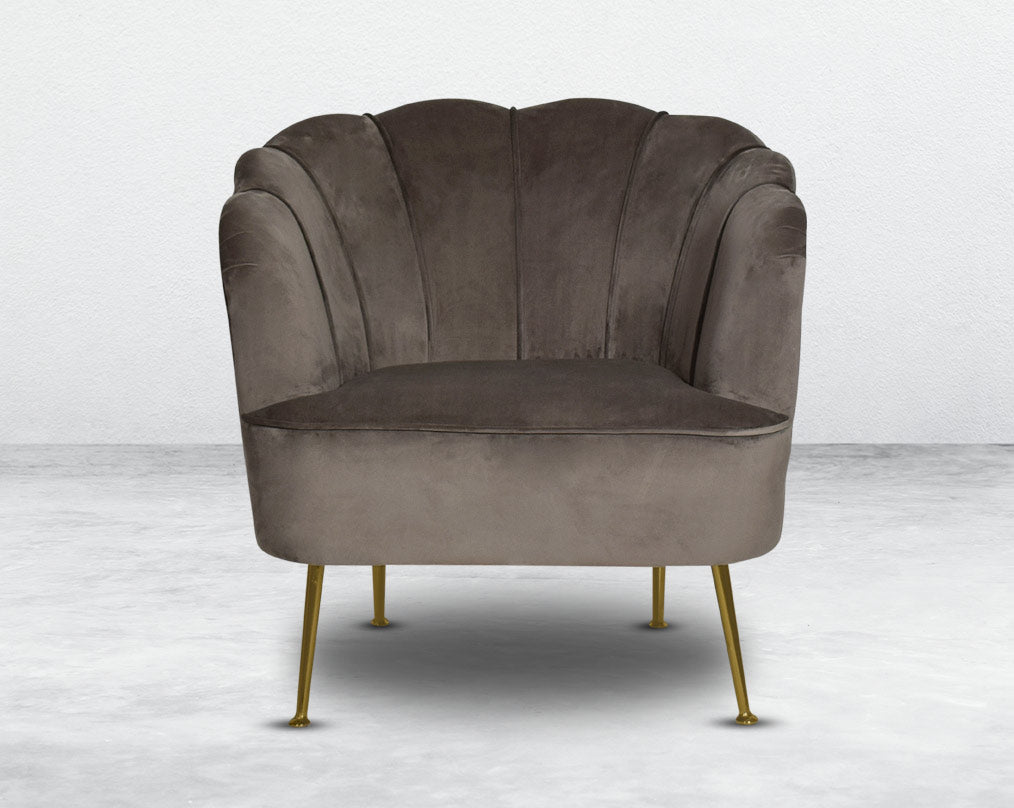 This 1 seater sofa set comes in a high-quality suede fabric with a quilted backrest that accentuates It has gold-plated stainless steel legs in modern classic design.