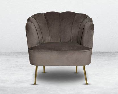 This 1 seater sofa set comes in a high-quality suede fabric with a quilted backrest that accentuates It has gold-plated stainless steel legs in modern classic design.