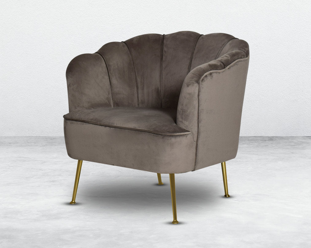 This 1 seater sofa set comes in a high-quality suede fabric with a quilted backrest that accentuates It has gold-plated stainless steel legs in modern classic design