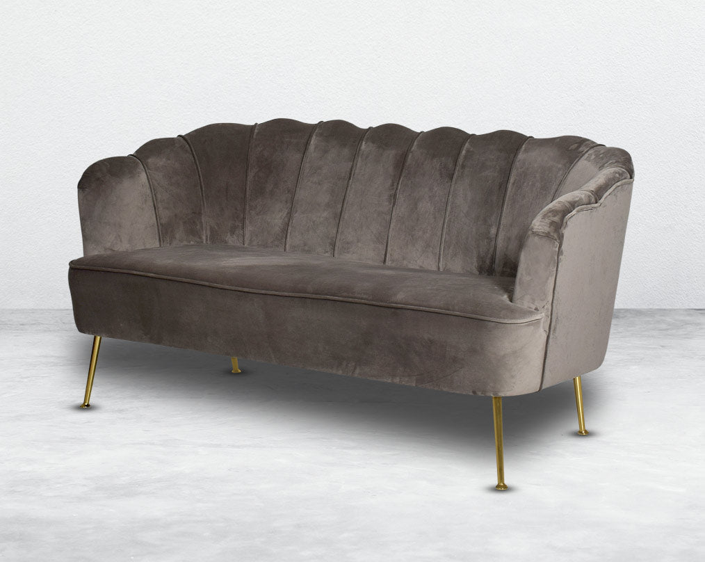This 2 seater sofa set comes in a high-quality suede fabric with a quilted backrest that accentuates It has gold-plated stainless steel legs in modern classic design.