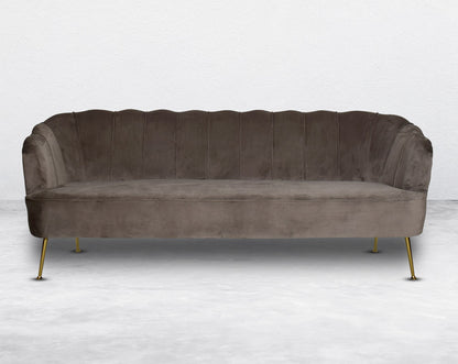 This 3 seater sofa set comes in a high-quality suede fabric with a quilted backrest that accentuates It has gold-plated stainless steel legs in modern classic design.