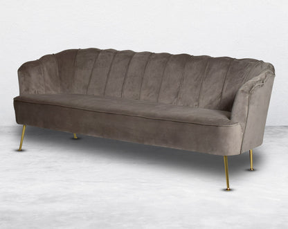 This 3 seater sofa set comes in a high-quality suede fabric with a quilted backrest that accentuates It has gold-plated stainless steel legs in modern classic design.