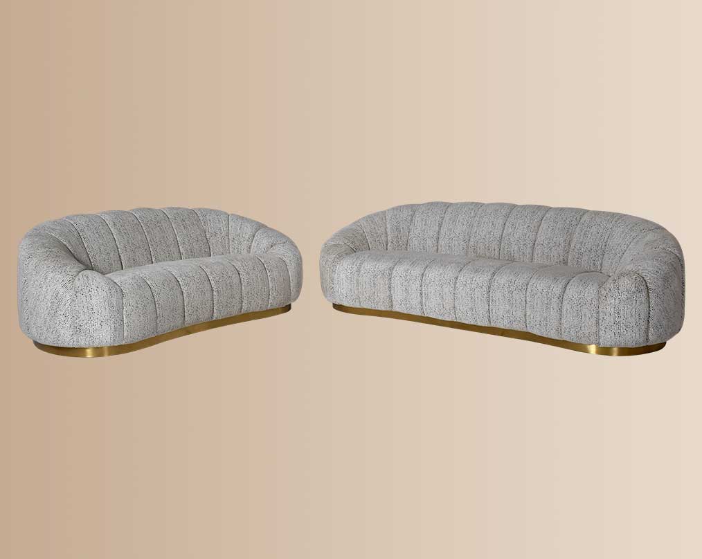 This 3+2 beautiful fabric sofa features vertical channel quilting with an outstanding design.
