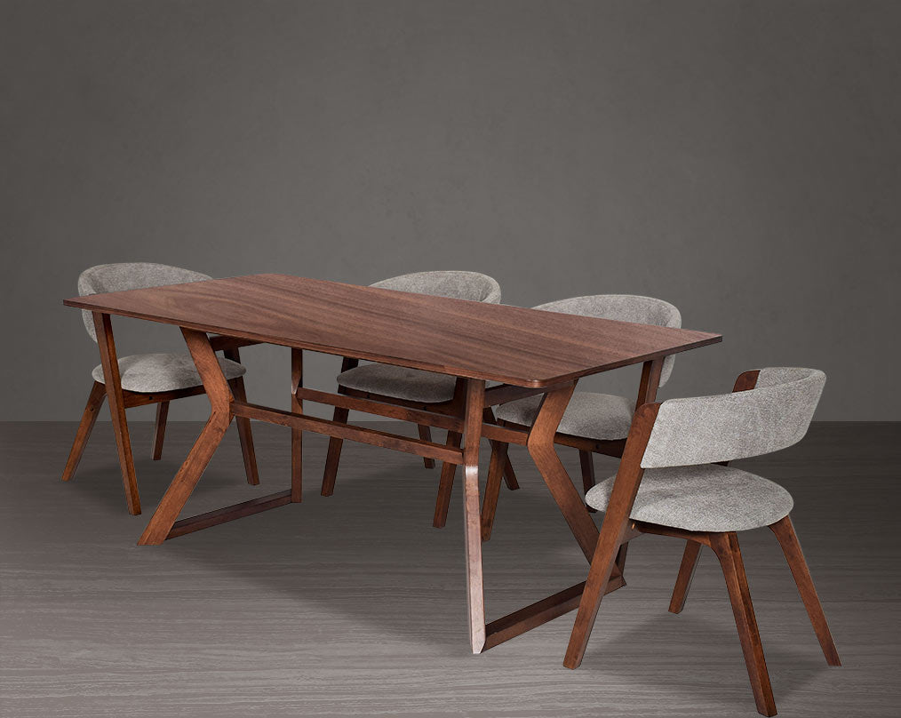 6 seater rectangular dining table in walnut. Dining chair in walnut with seat upholstered in fabric.