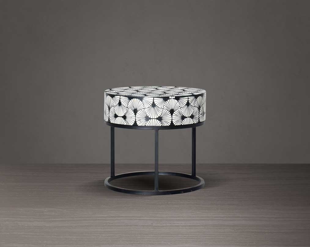 This gorgeous black and white end table in floral pattern with a black metal base is a perfect statement piece in your living room.