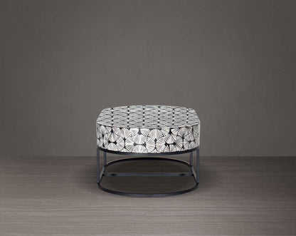 This gorgeous black and white end table in floral pattern with a black metal base is a perfect statement piece in your living room.