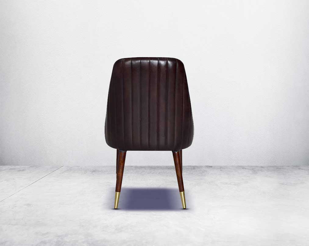 This rich contemporary dining chair in genuine leather makes for a luxurious dining experience back view