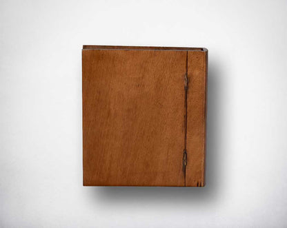 Table clock in  back antique matt brass and natural wood finish.