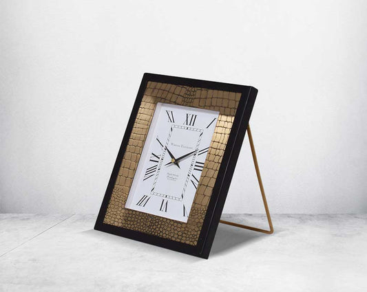 Rectangular table clock in croc etched design in matt antique brass finish & matt black frame with Roman numerals in rich contemporary design.