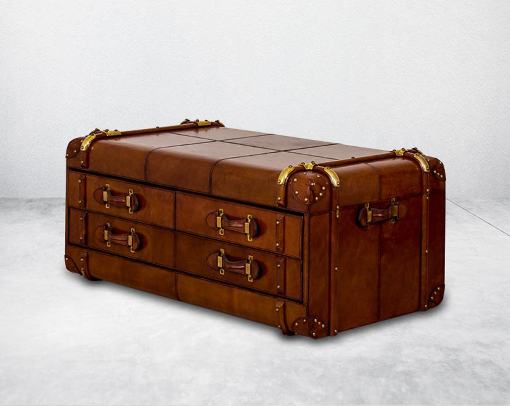 Coffee table in distressed cognac leather in a vintage look It comes with storage and 1 drawer in trunk design.