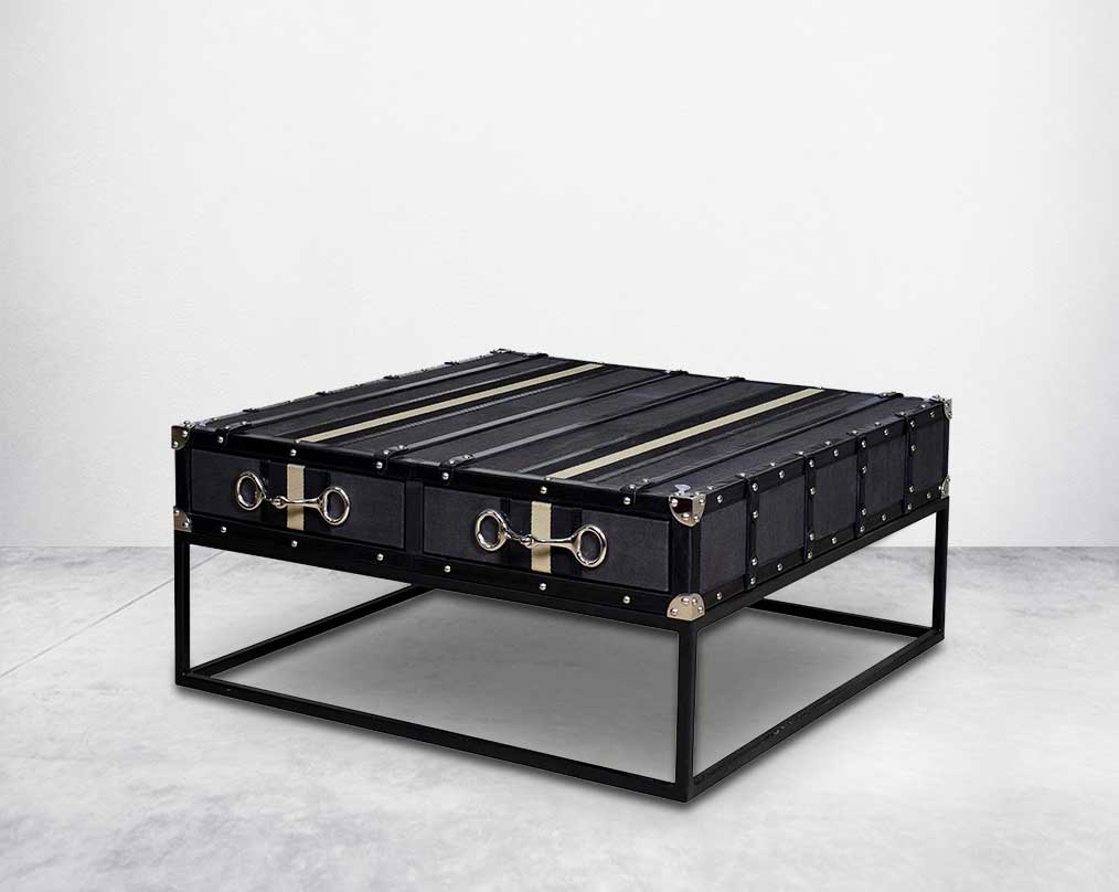 This coffee table inspired by the vintage trunk design motif makes a true focal point in any in modern, contemporary or eclectic decor