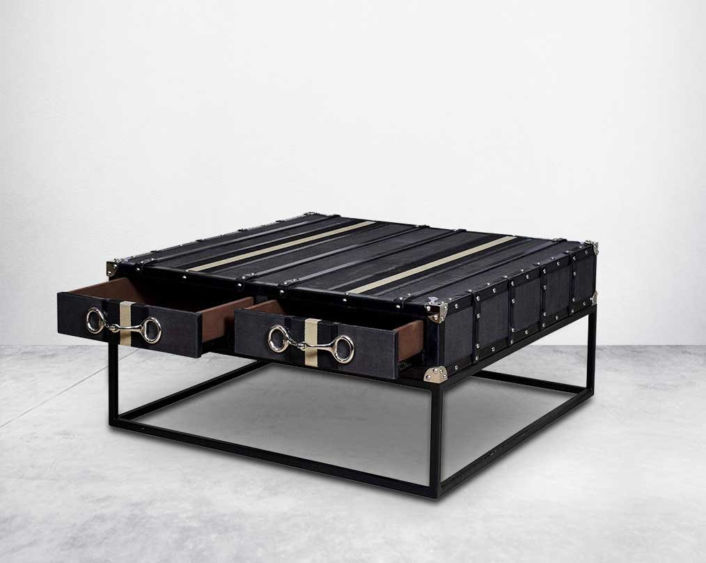 This coffee table inspired by the vintage trunk design motif makes a true focal point in any in modern, contemporary or eclectic decor open drawer 