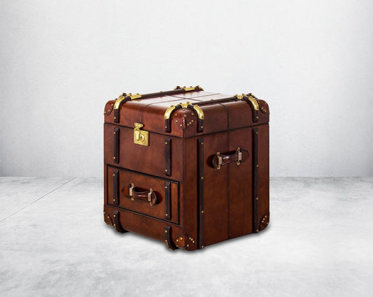 End table in distressed cognac leather in a vintage look with storage and 1 drawer in trunk design.