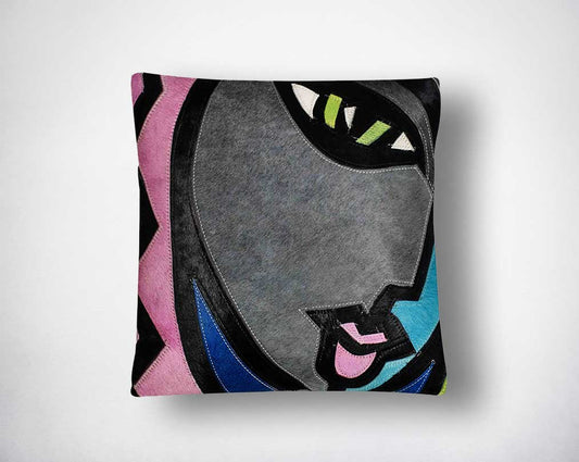 Multi-coloured hair on the leather cushion.