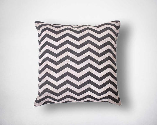 Patch suede leather cushion with geometric wavy print.