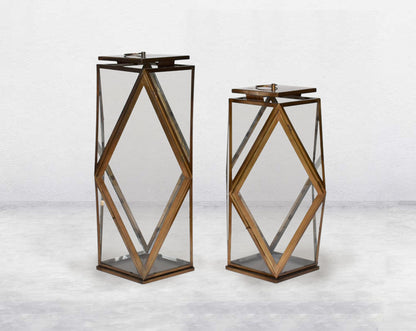Lantern with clear glass and brass-plated stainless steel.