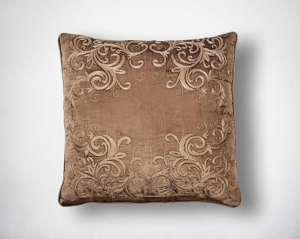 Gold embroidered poly silk cushion.